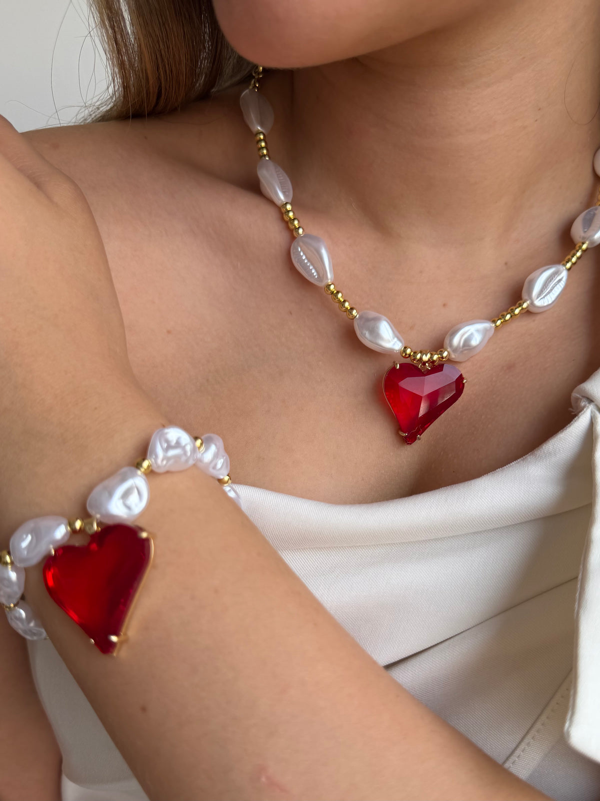 Set de Collar en perla con dije en corazon